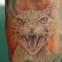 Tatuaje en el codo,  gato egipcio blanco furioso