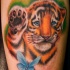 Tiger cub with butterfly in color tattoo