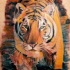 Aquarell Tiger in der Natur Tattoo