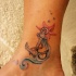 Tatuaje en el pie, ancla con onda y estrella de mar