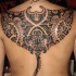 Tatuaje  tribal en la espalda