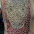 tribale stile 3D dettagliato a forma di  cranio messicano tatuaggio su costolette