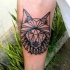 Tatuaje en el antebrazo,
lobo único interesante