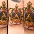 triplo immagine corona dorata tatuaggio