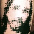 Typical black ink leg tattoo of Jesus portrait