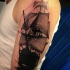 Typical colored shoulder tattoo of large and detailed sailing ship