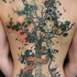 Unbelievable colored whole back tattoo of half tree half guitar