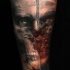 sconcertante meta` cranio meta` viso tatuaggio
