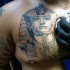 Unfinished black ink 3D like Pharaoh tattoo on chest