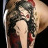 Illustrative style colored shoulder tattoo of seductive woman with rose and stars
