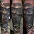 New school style colored forearm tattoo of human skull with pistol and bullets