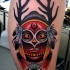 New school style colored leg tattoo of Indian mask with horns