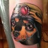 New school style colored arm tattoo of funny dog with hat