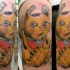 New school style colored shoulder tattoo of maneki neko japanese lucky cat with money and stone tablet
