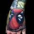 Illustrative style colored arm tattoo of funny Deadpool