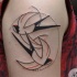 Illustrative style colored shoulder tattoo of flying birds