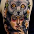 New school style colored shoulder tattoo of mysterious smoking woman with cat helmet