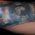 Unusual designed colored thug style dollar bill tattoo stylized with gangsta portrait