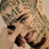 faccia lettering insolito tatuaggio
