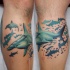 Usual designed and colored hammerhead sharks tattoo on leg