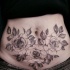 Usual projetado pela tatuagem de grandes rosas na barriga de Zihwa