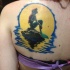 Tatuajes en el omóplato, sirena a puesta del sol