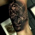 Tatuaje en el brazo, tigre salvaje, colores negro y blanco