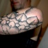 Tatuaje en el antebrazo, ornamento extraordinario simple