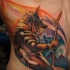 Watercolor anubis tattoo on ribs