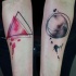 acquerello forme geometriche avambraccio tatuaggio