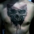 Watercolor like realism style black ink dark skull tattoo on chest