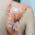 Aquarell Phönix Tattoo am Schulterblatt