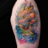 Watercolor style beautiful looking shoulder tattoo of sailing ship with lettering