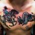 tema occidentale lotta  colorato cowboy con toro tatuaggio su petto