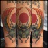 Tatuaje en el antebrazo,
escarabajo con alas y sol, estilo egipcio