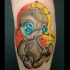 Wonderful 3D like multicolored leg tattoo of voodoo doll
