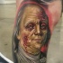 Zombie style colored thigh tattoo of American president portrait