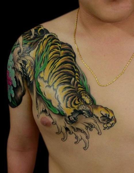 Crawling tiger  tattoo  on shoulder and chest