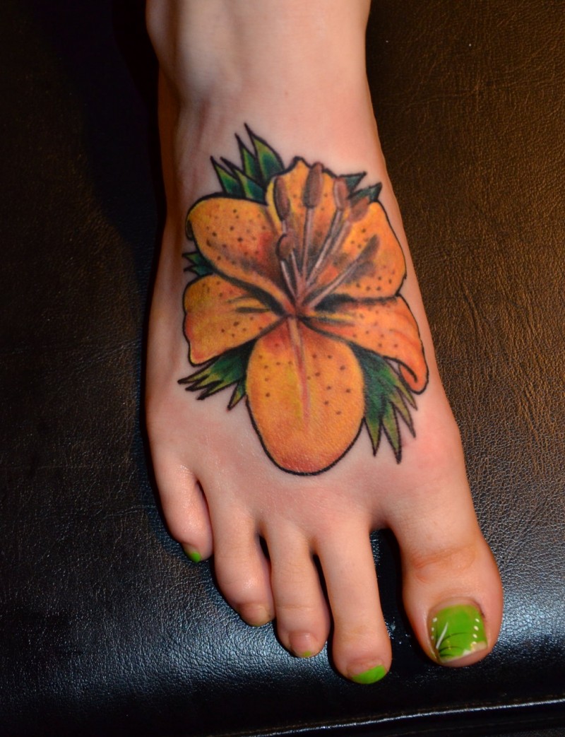 Tiger lily tattoo on ladies feet