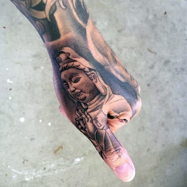 Tiny black and gray style Buddha statue tattoo on on finger