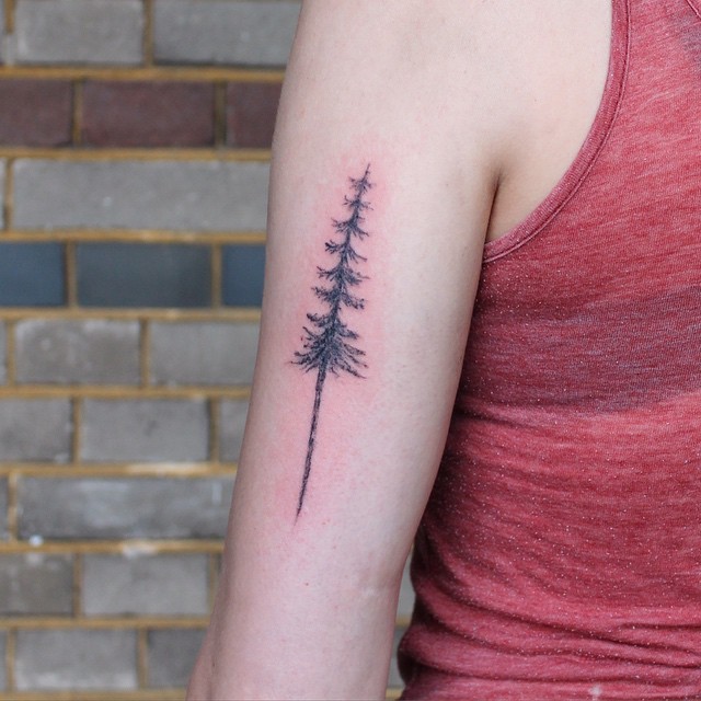 Tiny black ink simple arm tattoo of lonely tree