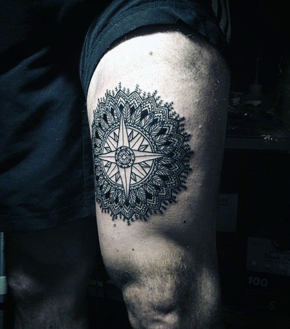 Tiny black ink very detailed thigh tattoo of flower