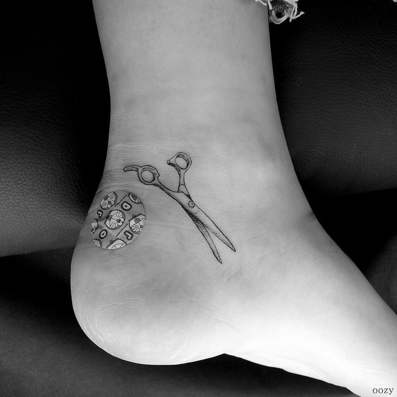 Tiny hairdresser's scissors realistic ankle tattoo