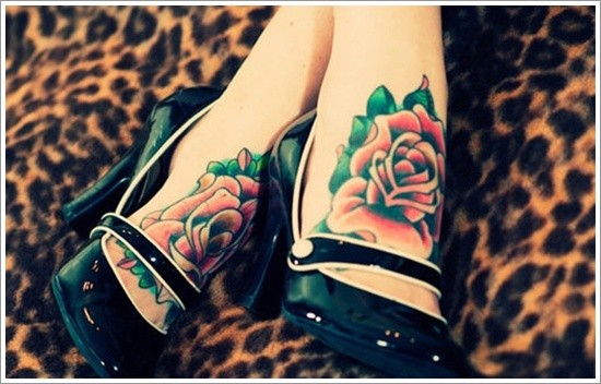 Traditional colored and painted little roses tattoo on feet