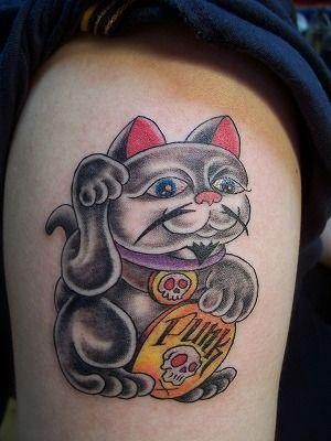 Cute traditional japanese cat tattoo