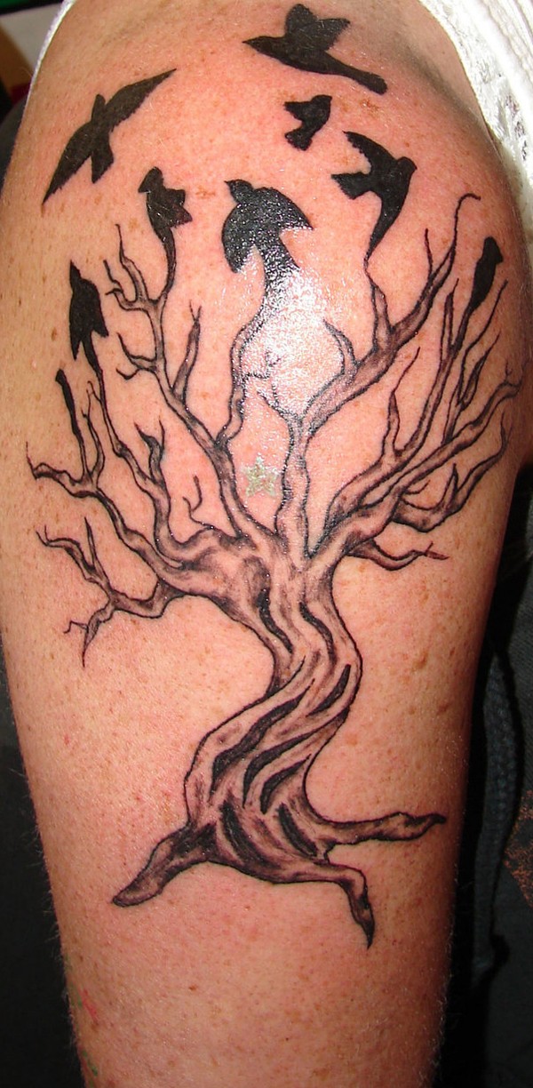 Tree and bird black tattoo
