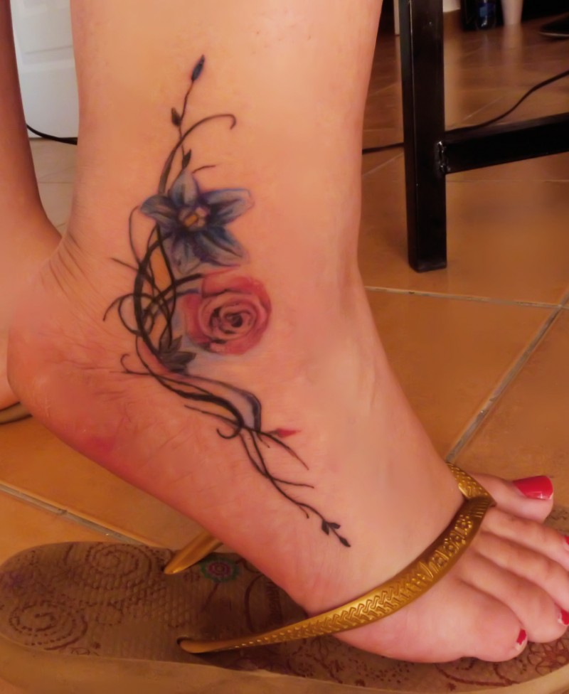 Tribal and color flowers ankle tattoo for girls
