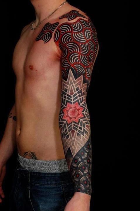 Tribal style awesome colored flower shaped ornaments sleeve tattoo