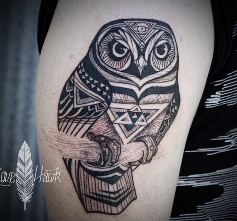 Tribal style designed and painted big black ink owl shoulder tattoo