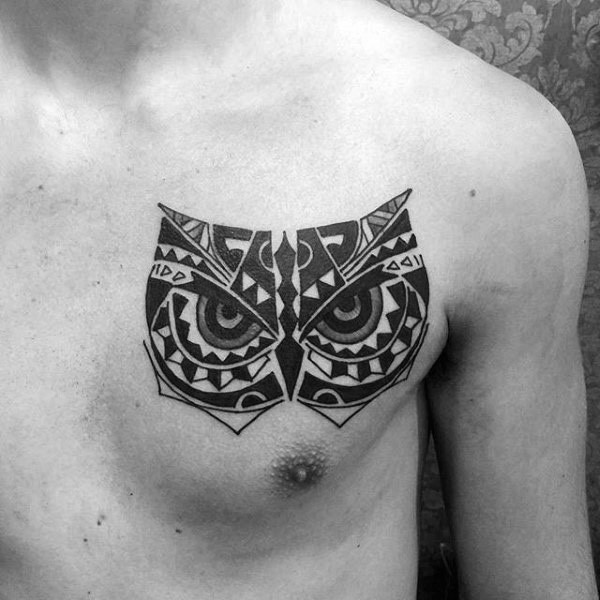 Tribal style owl&quots head original tattoo on chest